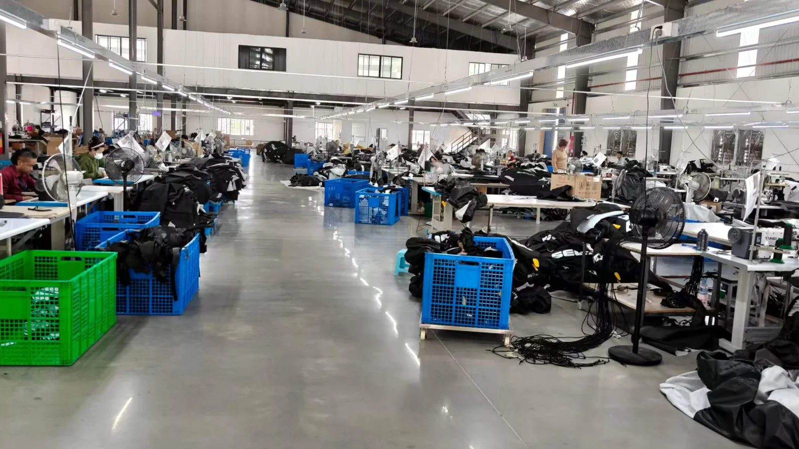 Production team working on protective covers